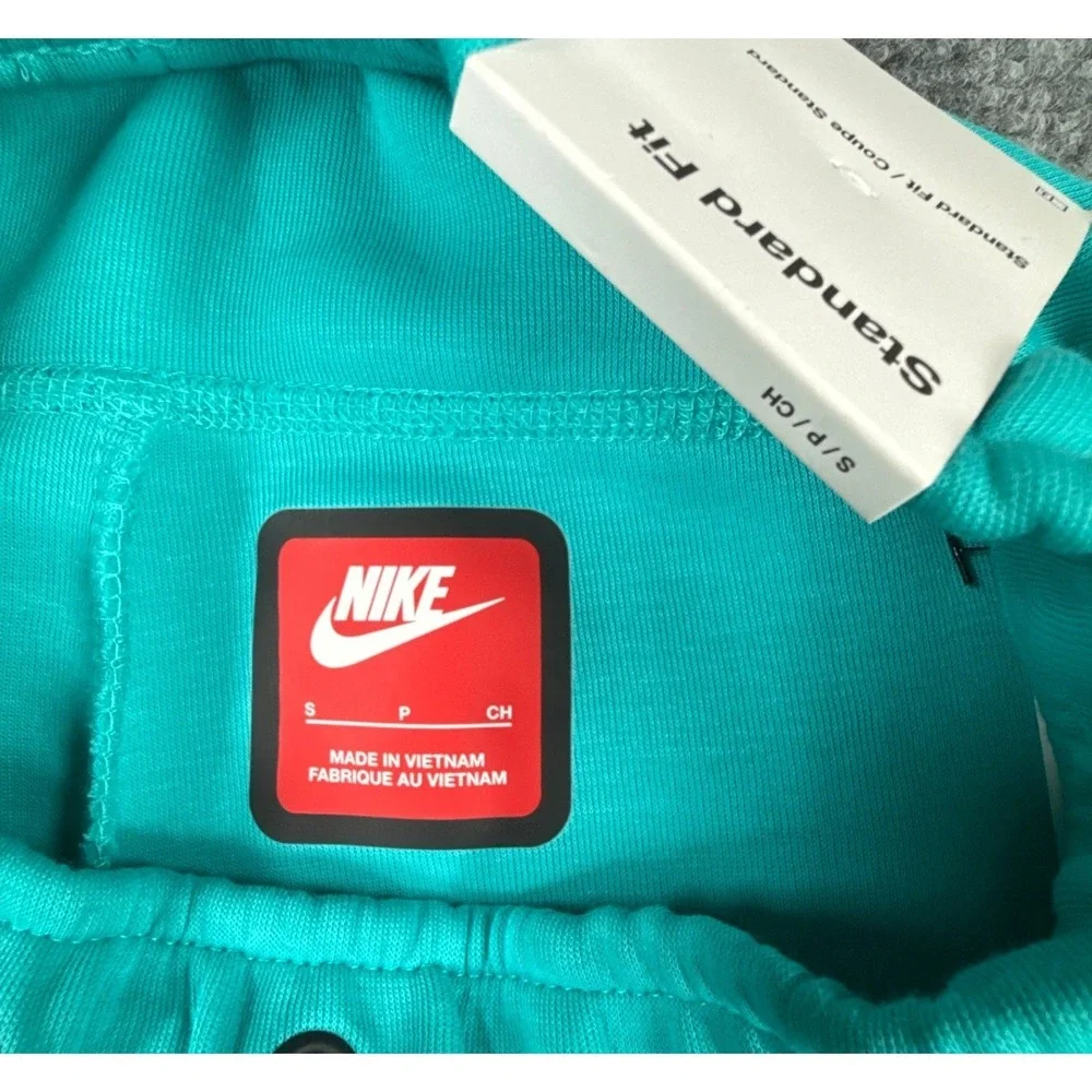 Nike Tech Kids Small Teal Green Fleece Drawstring Shorts Zip Pocket NWT